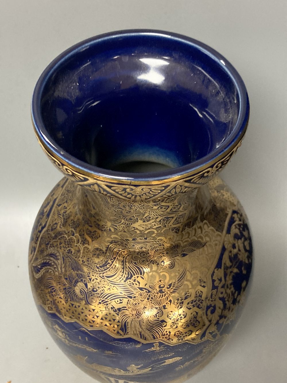 A Japanese satsuma vase, a tea cup and saucer and another vase, tallest 37cm